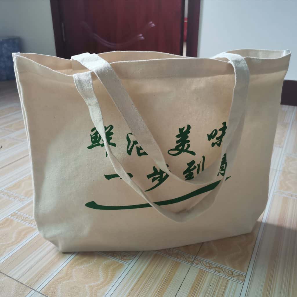 用帶有印刷廣告的帆布袋菜兜子 買菜更方便